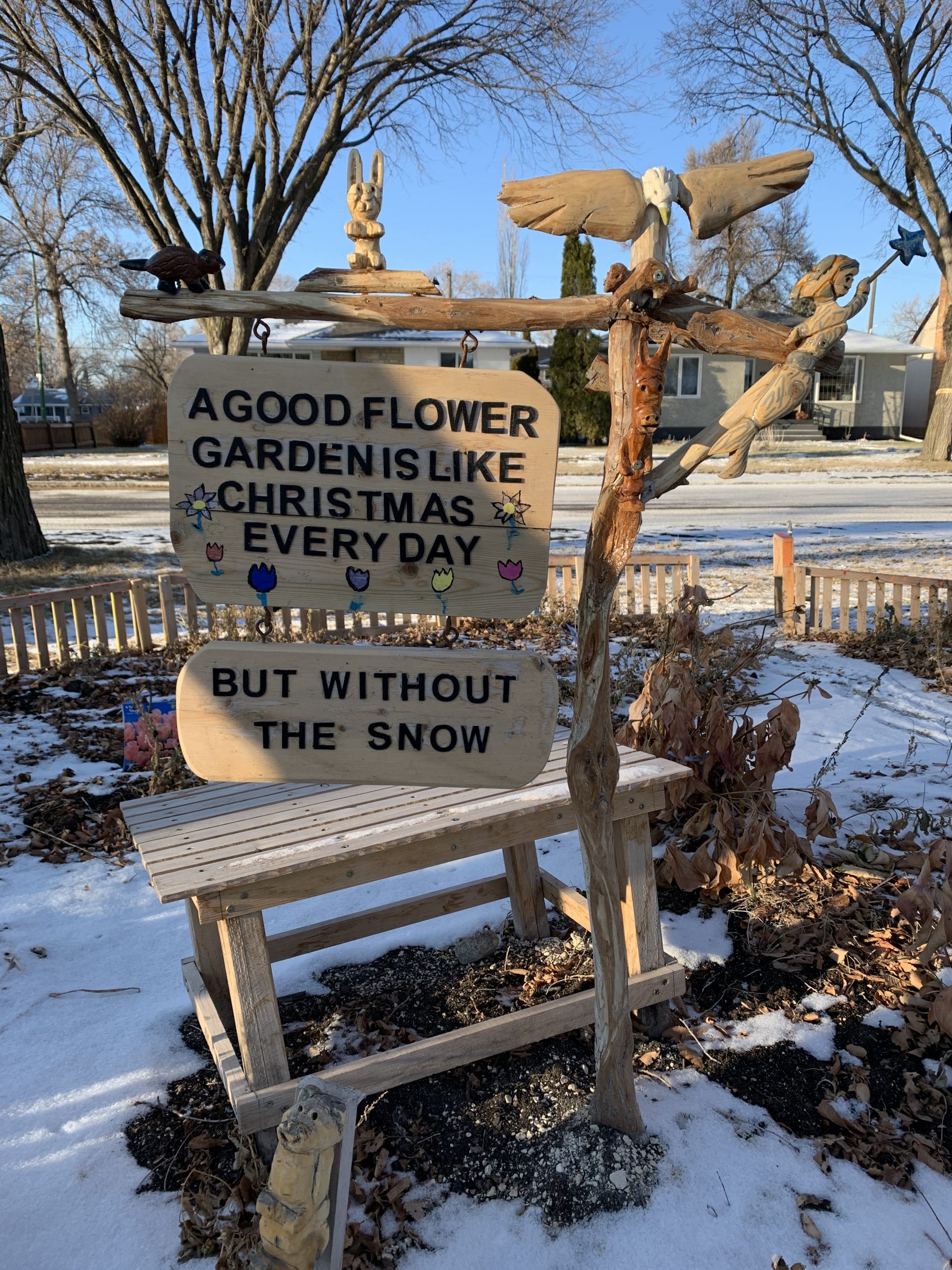 children's garden sign with carvings