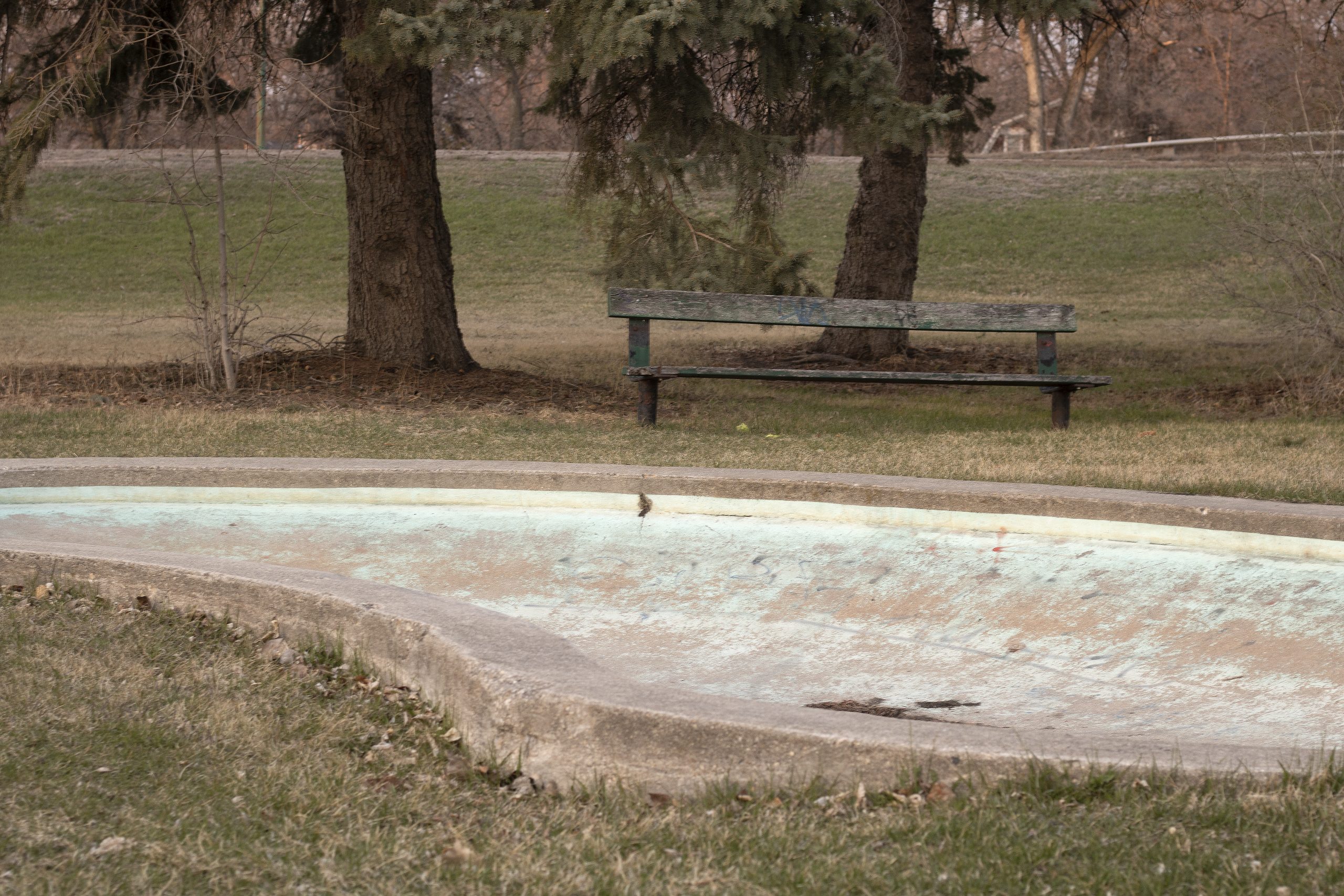 cement pond and broken bench